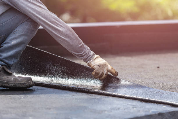 Professional Basement Waterproofing technician working in Marriottsville, MD
